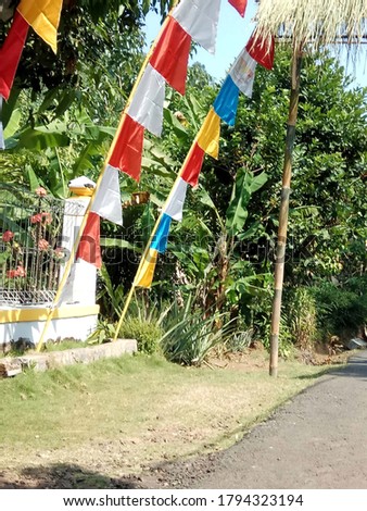 The Indonesian flags waiving in front of the house to celebrate the Independence Day of Indonesia every 17th of August. Indonesia free from Dutch colinialism at August 17th, 1945. 