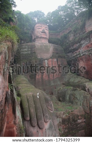 View of the world's largest stone Buddha statue Leshan Giant Buddha in Leshan city, Sichuan, China. 