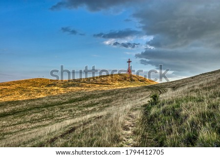 In the background the cross of the pratomagno at 1590 meters above sea level