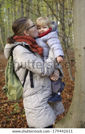little toddler outdoors in the forest