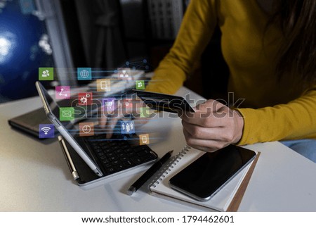 Double exposure of businesswoman hand  working on smartphone and laptop with business financial infographic chart, Digital marketing concept, Background toned image blurred.
