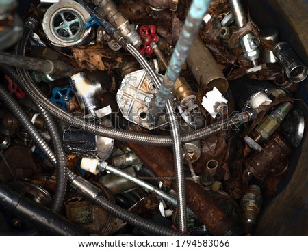 Parts scrap rusty metal background.
 Recycling junkyard