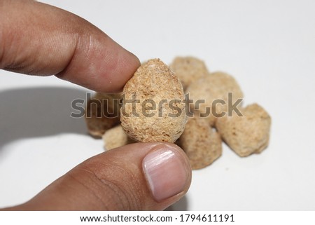 A picture of soya chunks on white background