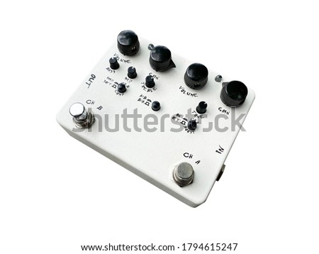 Isolated white overdrive dual-channel stompbox electric guitar effect for studio and stage performed on white background with clipping path. music concept.
