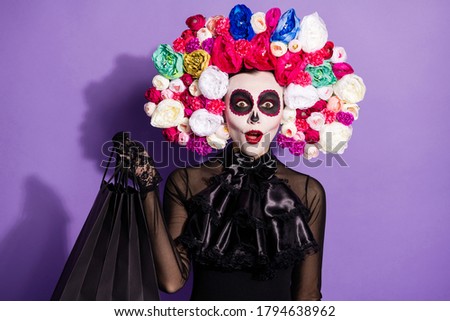 Photo katrina dead bride role play event character lady party preparing face print holiday hold shopper bags clothes floral rose headband black costume dress isolated purple color background