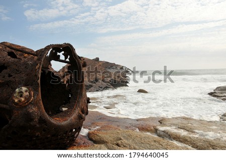 A once proud vessel lying in rusted pieces and is slowly disappearing