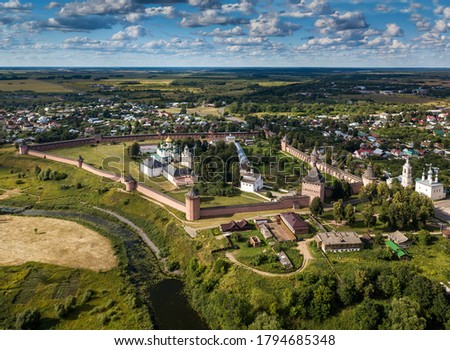 Panoramic aerial view of ancient city Suzdal and Saviour Monastery of St. Euthymius at sunny day. Golden ring of Russia, Vladimir region. Aerial drone photo.
