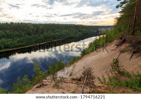 Palieozerskaya hydroelectric power plant and Suna river in Hirvas, Karelia region, Russia). Hydroelectric dam, reservoir, powerhouse, waterway, spillway gates. Girvas beautiful scandinavian landscape