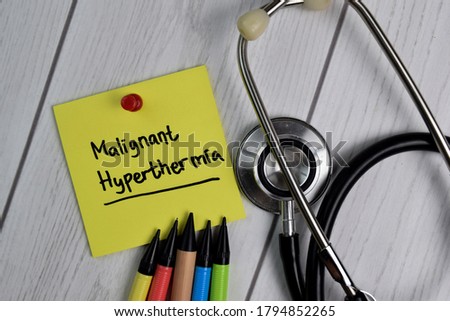Malignant Hyperthermia text on sticky notes with office desk. Healthcare/Medical concept Royalty-Free Stock Photo #1794852265