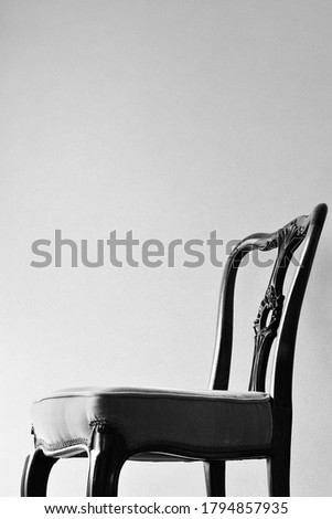 room of the antique mahogany chair.  
This expensive furniture is made in Britain.

blurred background with copy space.
Image for black  white photograph.