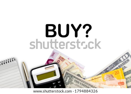 BUY ? text with fountain pen, calculator, notepad and currency banknotes on white background. Business Concept