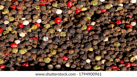 Black pepper - dried black pepper berries, which are harvested still green and unripe. widely used as a spice and seasoning and can be used whole (peppercorns)
