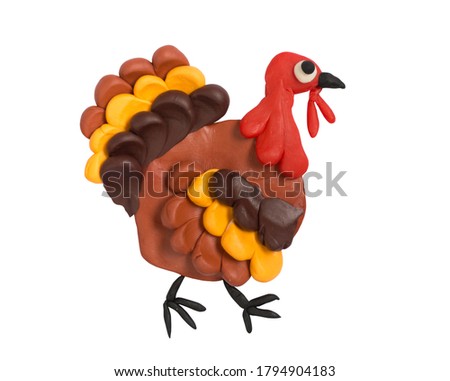 Fun cartoon Thanksgiving turkey. Plasticine kids artwork.