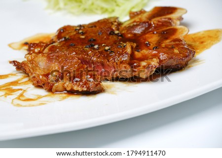 Sliced sirloin steak on a plate