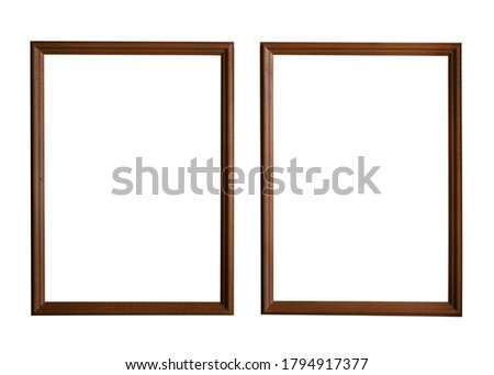 Two vertical thin dark brown classic frames for text, picture, photo, image, text isolated on a white background