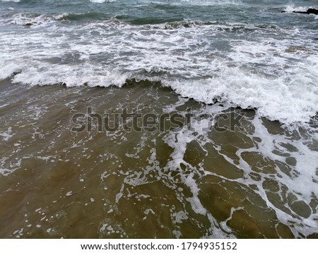 sea wave off the coast in a storm coming