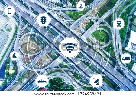 Smart transport technology concept for future car traffic on road . Virtual intelligent system makes digital information analysis to connect data of vehicle on city street . Futuristic innovation . Royalty-Free Stock Photo #1794958621