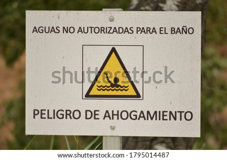 Swimming is prohibited. Danger of drowning.Peligro de ahogamiento.