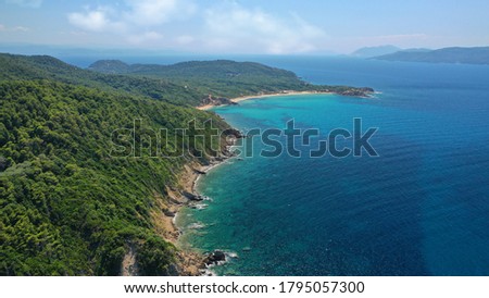 Aerial drone photo of paradise twin beaches of Mandraki and Elia in island of Skiathos island, Sporades, Greece