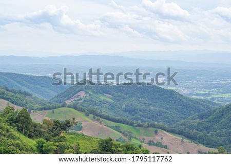 Scenic view of mountains against cloud sky. Nature photography. Space for text
