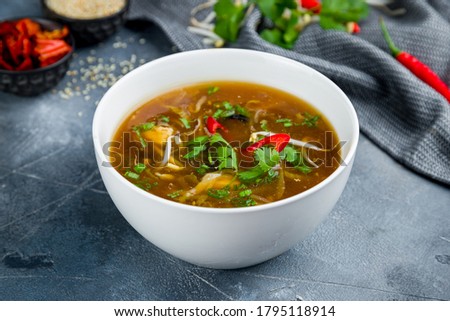 spicy sour soup Chinese cuisine Royalty-Free Stock Photo #1795118914