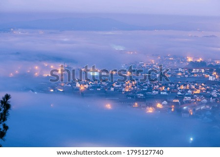 beauty city of the fog with magic light and misty at sunrise