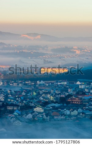 beauty city of the fog with magic light and misty at sunrise