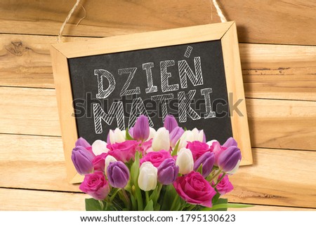 A bouquet of flowers and a Polish translation for mother's day