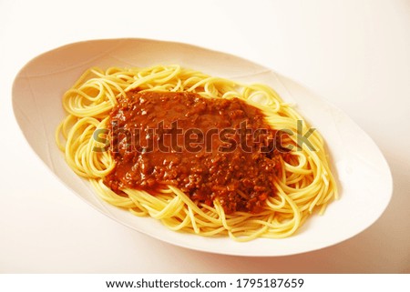 Delicious spaghetti on the plate.