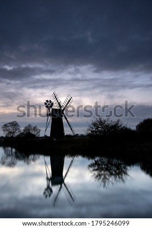 How Hill windmill and wind pump in Norfolk, England. High quality photo