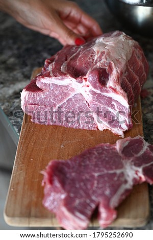 piece of cut pork meat close up