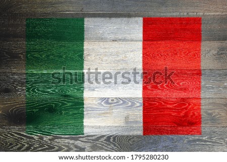Italy flag on rustic old wood surface background