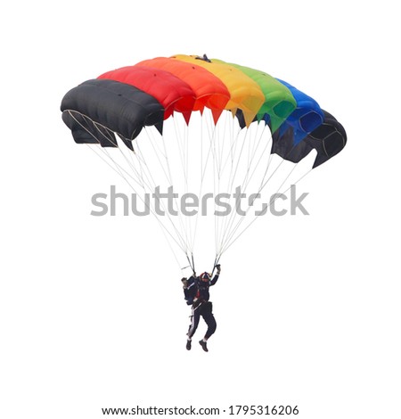 Paratrooper is controlling parachute in the air , picture isolated on white background. This has clipping path. Royalty-Free Stock Photo #1795316206