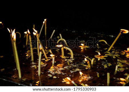 candle holder with candles in the Church