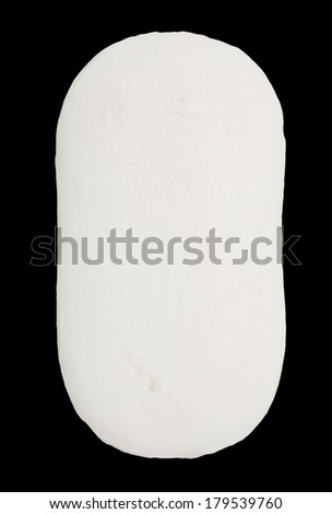 old white soap on a black background