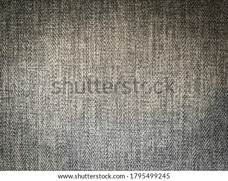 Photography of fabric texture with rustic surface background, vignette design.