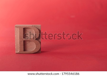 Letter type B on a red background