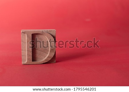 Letter type D on a red background