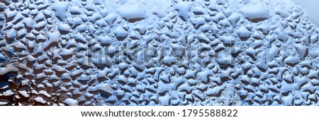water dew drops on glass bottle surface macro photo