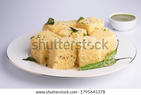 Chana Dal Dhokla served with mint chutney, selective focus Royalty-Free Stock Photo #1795645378