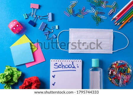 different stationary items and means of anti virus self protection on blue backround