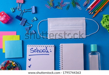 different stationary items and means of anti virus self protection on blue backround