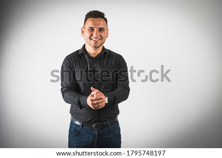 young emotional man shows hand gestures, isolated on a white background there is a place for the inscription text 