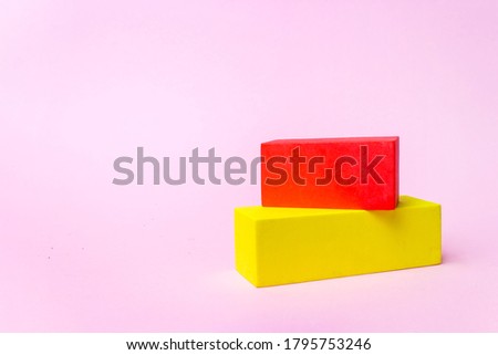 Business concept - Abstract geometric cube on pink background, for display or montage word. Business plan concept for growth success process. mock up or template. Close, cubic