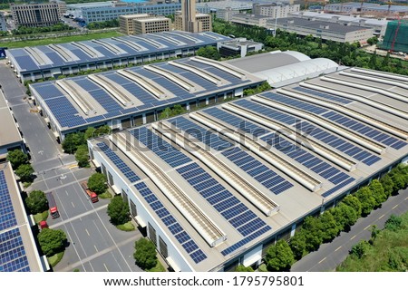 solar power station with factory Royalty-Free Stock Photo #1795795801