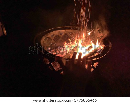 Campfire fun gathered around fire