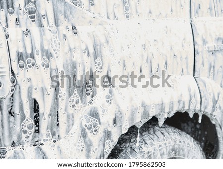 Car in foam, car wash