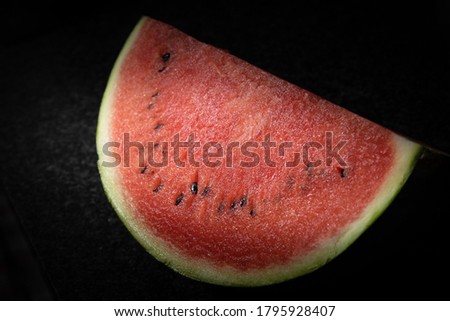 Watermelon lit to see red colors and texture
