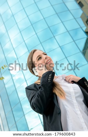 Business woman with mobile front office