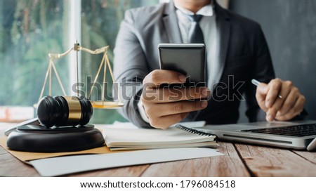 businesswoman hand using smart phone,mobile p payments online shopping,omni channel,digital tablet docking keyboard computer at office in sun light
